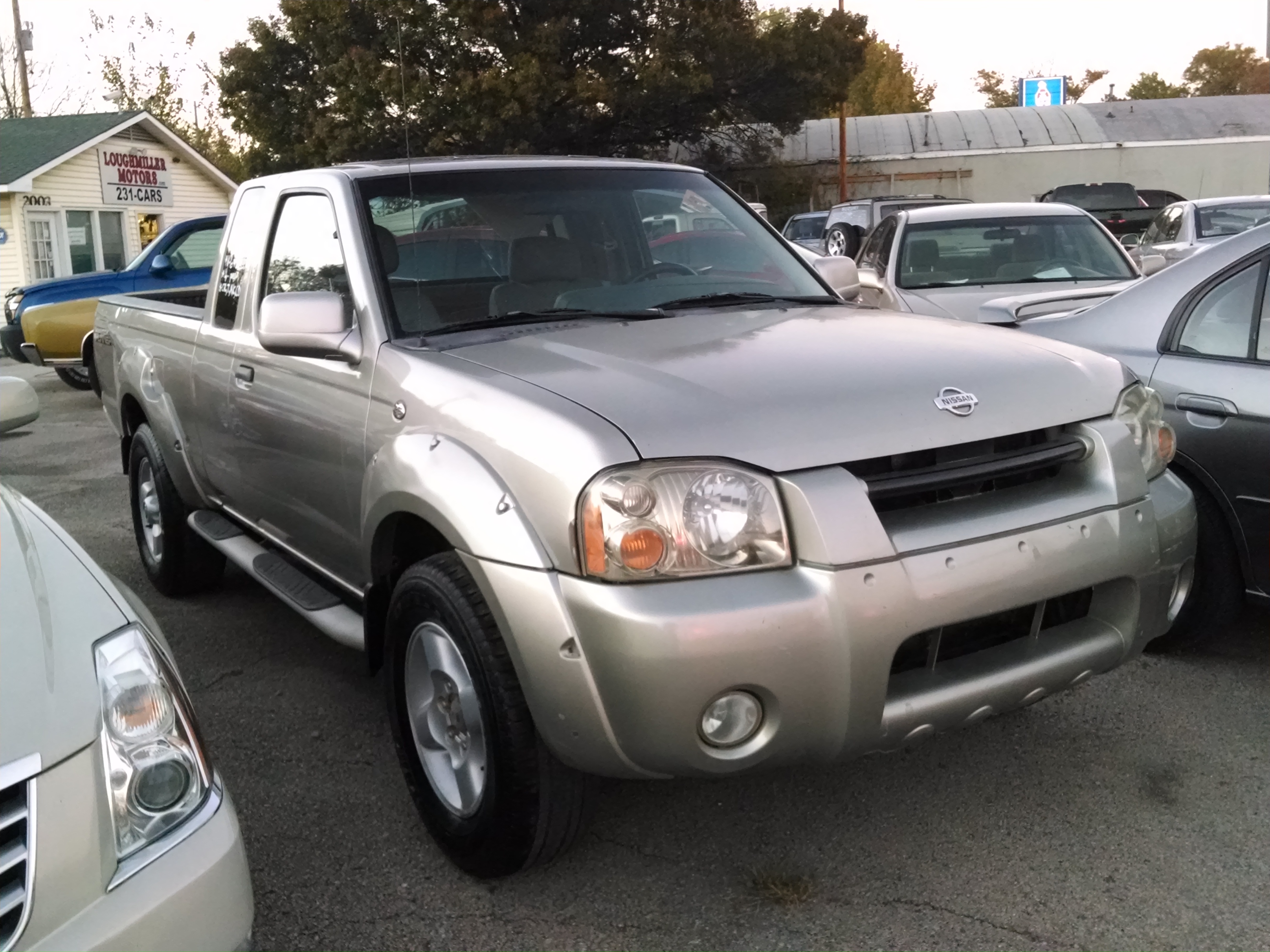 Pewter, light grey cloth interior, V-6, 5 speed, one owner, 2 door ...