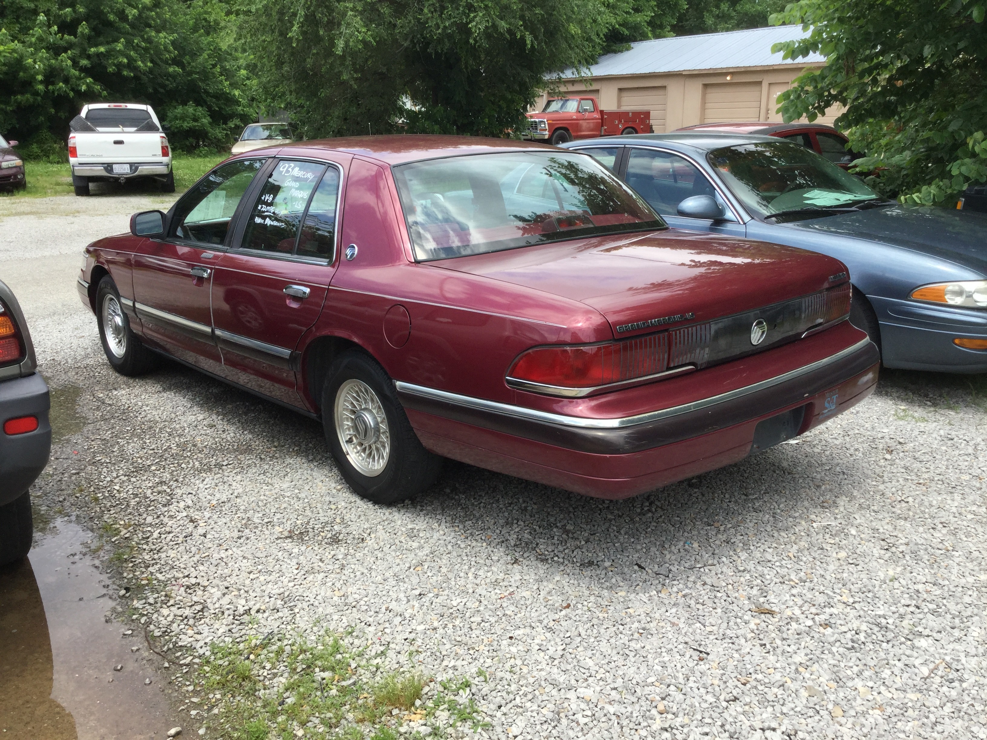Burgundy, cloth interior, V-8 4.6 liter, auto, 4 door, keyless entry, a